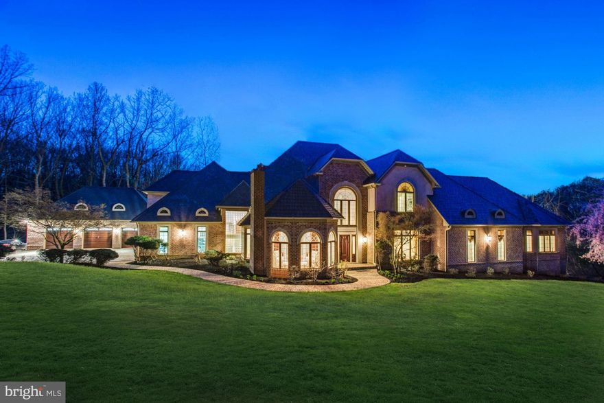 This magnificent estate, resting on a 3.12 acre lot, offers peace, tranquility and privacy on a gorgeous hilltop setting. Experience breath taking grandeur as the solid Mahogany door opens, granting entry to a spacious world with soaring ceilings, designer light-fixtures, custom-designed curved stairway and intricately detailed molding to name a few. Cook awe-inspiring meals in the chef s kitchen or relax by the fireplace in the great room with sweeping views of the landscape. Live a life of splendor in the new addition master suite, offering a private seating area, custom walk-in closets, personal washer & dryer and a spa-like master bathroom with unique features. Expanded and Renovated in 2007, this home boasts hardwood floors, engineered slate roof, Pella windows, Insteon programmable lighting system and each room equipped with a smart thermostat in a phenomenal floor plan. Public record does not reflect  2007 addition.