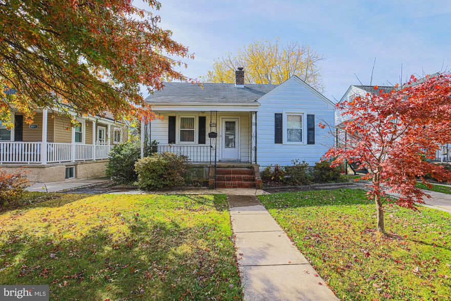 COZY 3 Bedroom 1 FULL Bath Cape Cod in Parkville * Features Include: COVERED front porch * BEAUTIFUL hardwood floors * Gas FIREPLACE in the living room * BREAKFAST bar * Large SUN FILLED sunroom overlooking the HUGE fenced yard with plenty of mature trees * EXPANSIVE upper level bedroom * One car rear ATTACHED garage * MULTI car driveway * PLENTY of storage in the unfinished basement and laundry * A must see!!