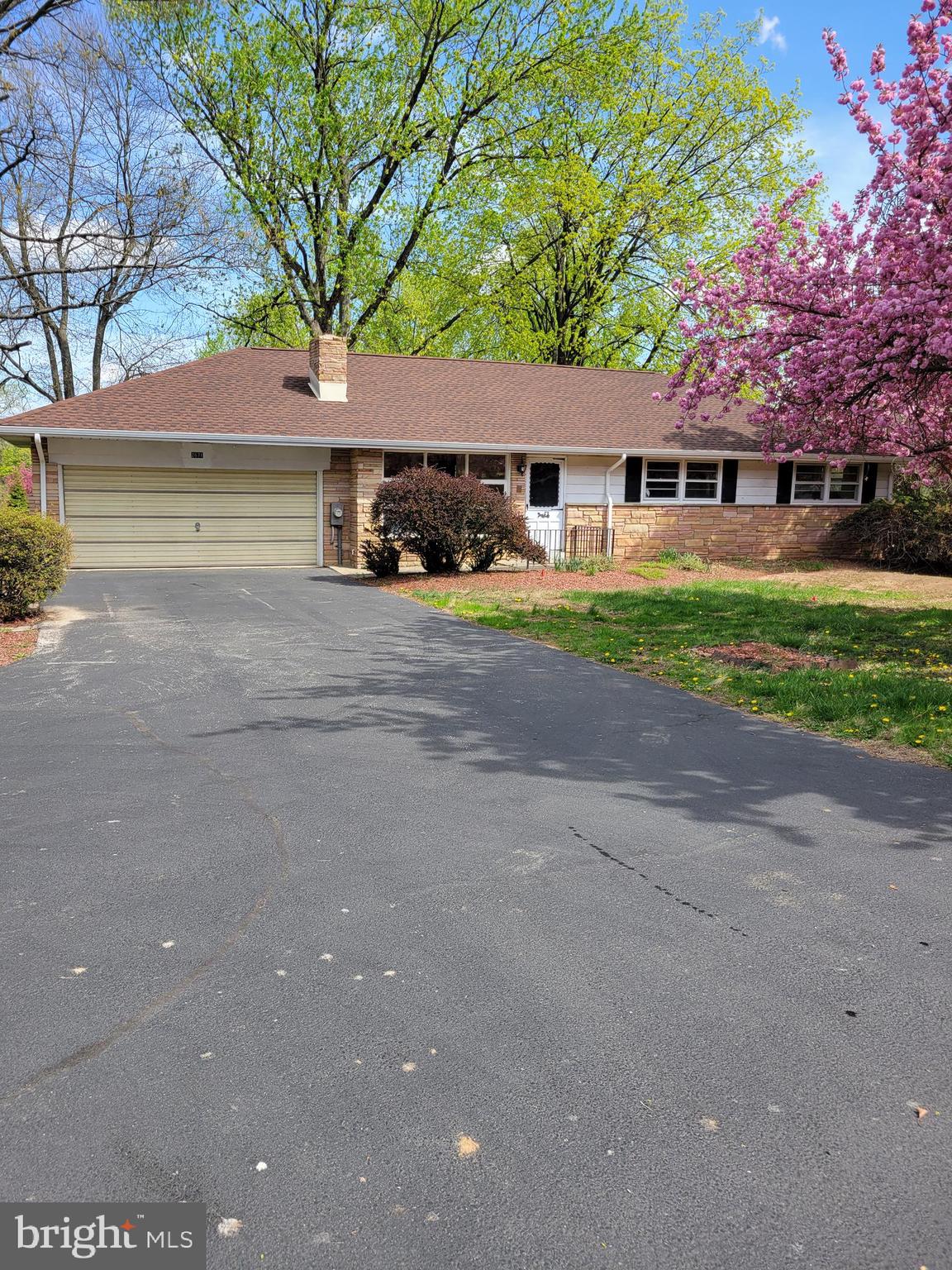 This is not a pet friendly property. This awesome 3 bedroom/1 bath ranch home has a lot to see. From the beautiful flowering trees in spring to the huge, flat, fenced in backyard. Enter through the front door and you will be greeted by an oversized Living Room/Dining Room combination room. From the front door, you can see all the way to the backyard. Lots of potential uses for this area. There is a Kitchen directly next to the Dining Room and it has been updated and has an awesome breakfast bar/island for an eat in kitchen. Head down the hallway to find the Bathroom which has double sinks and has a surround tub/shower unit, it is a nice sized bathroom. The Bedrooms all have carpeted floors and are all nice sized. Primary is the one in the front farthest down the hallway. Downstairs you will find a finished section of the basement that has an oversized Family room. The fireplace is decorative only and does not work but adds a lot of character to the room. There are storage cabinets and a sink for entertaining. Next to the Family room you will find a workshop/storage area that has egress to the back of the home. You aren't done yet... Back upstairs to the left of the Dining room is access to a private office completed separate from the house and the storage space in front of that is for a motorcycle, bikes, lawnmowers etc. but is not a full 2 car garage. Do not forget to stop out back for a great backyard and several decks and levels of decks for amazing entertaining outside. NO PETS! This is a month to month lease.
