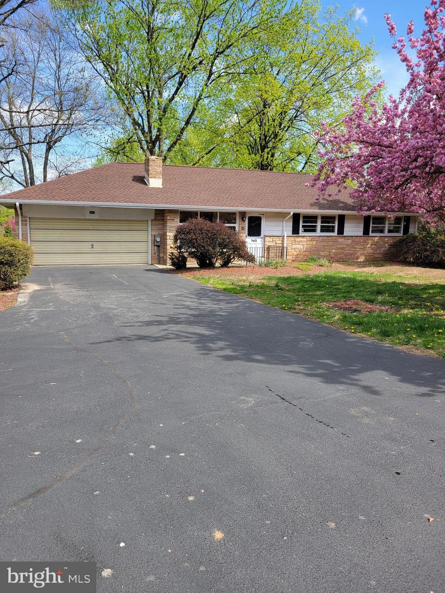 This is not a pet friendly property.  This awesome 3 bedroom/1 bath ranch home has a lot to see.  From the beautiful flowering trees in spring to the huge, flat, fenced in backyard.  Enter through the front door and you will be greeted by an oversized Living Room/Dining Room combination room.  From the front door, you can see all the way to the backyard.  Lots of potential uses for this area.  There is a Kitchen directly next to the Dining Room and it has been updated and has an awesome breakfast bar/island for an eat in kitchen.  Head down the hallway to find the Bathroom which has double sinks and has a surround tub/shower unit, it is a nice sized bathroom.  The Bedrooms all have carpeted floors and are all nice sized.  Primary is the one in the front farthest down the hallway.  Downstairs you will find a finished section of the basement that has an oversized Family room.  The fireplace is decorative only and does not work but adds a lot of character to the room.  There are storage cabinets and a sink for entertaining.  Next to the Family room you will find a workshop/storage area that has egress to the back of the home.  You aren't done yet... Back upstairs to the left of the Dining room is access to a private office completed separate from the house and the storage space in front of that is for a motorcycle, bikes, lawnmowers etc. but is not a full 2 car garage.  Do not forget to stop out back for a great backyard and several decks and levels of decks for amazing entertaining outside.  NO PETS!  This is a month to month lease.