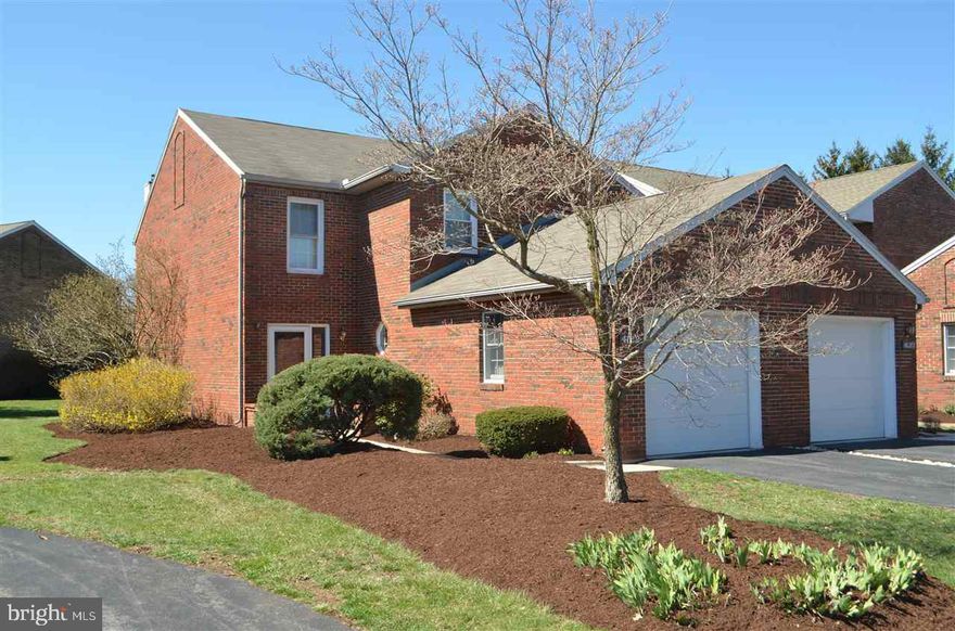 Impeccably kept 3 BR 2.5 BA Beaumount Square townhome with 1 car garage. Home features Brazillian Cherry hardwood floors in the entry hallway, half bath, DR & LR.  The Kitchen & Laundry rm have ceramic tile flrs.  Kitchen features granite counter tops, tile backsplash & stainless appliances.  The 2nd floor features two master suites with new carpet.  The basement has a large FR for entertaining & a third bdrm. Basement has new carpet & plenty of unfinished storage.  This home is a must see! Won't last long!