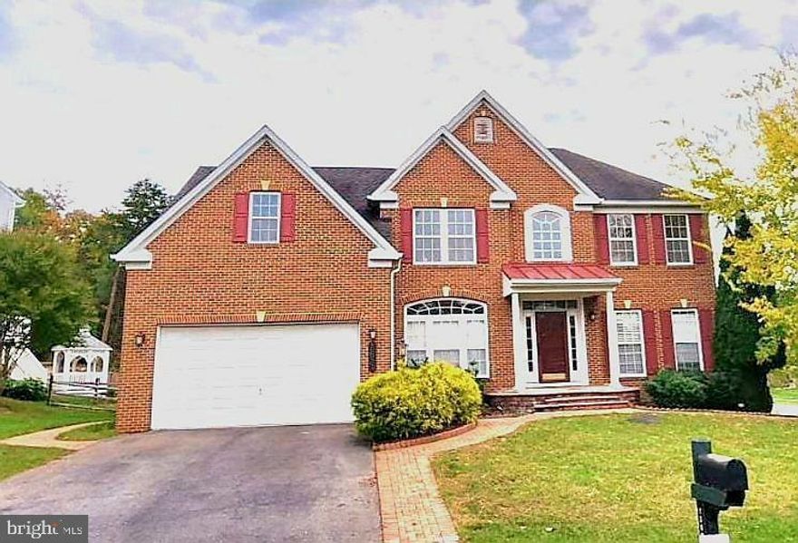 Location!!! Location!!! Beautiful brick  home located in sought after Cross Creek Club house . The home features Large rooms with high ceilings, dual staircase, wood floors, expansive living and dining room, morning room, a dedicated home office; perfect space for remote work.  The upper level boasts a sumptuous primary suite along with three additional bedrooms, ample storage space and two full bathrooms. The finished walkout lower level is a welcoming space for guests or in-laws, with a kitchen, a full bath, a bedroom and an additional flex room. Finally, the backyard offers a stone paved patio and a spacious deck for outdoor entertaining or weekend cookouts with the family. This property is the perfect blend of luxury, convenience, and community, making it an exceptional place to call home. Conveniently located near schools, shopping, dining, and major commuter routes. The whole house was freshly painted and made ready just for you and is truly move-in ready. Schedule your showing today! Don't miss out !!!