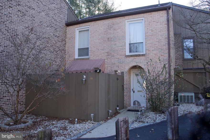 Welcome to 79 Wedge Lane, a 2-story townhouse in excellent condition located in the Beautiful Flying Hills Development.    Entrance foyer provides a guest closet and powder room.  The charming dining room and living room leads to a private screened in porch.  The fully equipped kitchen with newer appliances remaining offers tile floor and backsplash.  The sliding door exits to a private front patio.  Spacious master bedroom offers a wall of closets and bath.  The second bedroom features walk-in closet.  This level also provides a hall bath.  Descend to the lower level which features a comfortable family room with gas fireplace, built in cabinets, desk area and shelves.  The utility room offer newer washer and dryer and utility sink.  This level also provides a generous size storage room.  Bar in family room will remain.  Call to schedule your tour!