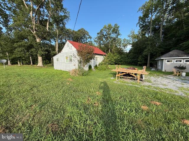 This is an opportunity of a life time. There are 2 a joining properties being sold as one. The total acreage is approx. 2.2 acres. The home located at 10105 has a drilled well and a spetic . The home is heated by a pellet stove and cooled by a portable A/C unit. This property also has a new shed . The owner will probably be leaving many of the items in home and shed. The property next door also has electric . Both of these properties are being Sold As Is. THE PRICE HAS BEEN REDUCED TO $175,000.00!