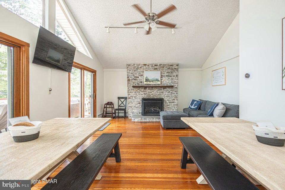 Stunning Lakeview Pocono vacation home nestled in popular Lake Harmony boasts 5 bdrms, 3 full baths, huge game room, two decks, new hot tub.... the list is endless! Step into the spectacular great room with floor-to-ceiling stone fireplace, gleaming hardwood floors, & cathedral vaulted ceilings. The bright kitchen features ceramic tile flooring, sleek white cabinets, & leads to the bright living room. The bedrooms have wall-to-wall carpeting & large closets! The walk-out basement has a media/game room with pool table, arcade, & full bathroom. Plenty to do at Jack Frost/Big Boulder, the Pocono Raceway, Camelback, Camelbeach, Split Rock's indoor waterpark, Kalahari, Mt Airy Casino, Pocono Premium Outlets, Hickory Run State Park, golfing & whitewater rafting in Jim Thorpe! STR friendly! Huge investment potential as a lakeview chalet!