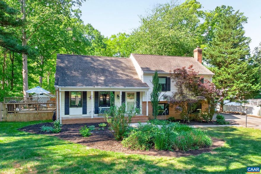Welcome to this well-maintained quad-level home in the sought-after Tuckahoe Village West subdivision. The charming country front porch leads into the foyer, with a spacious dining room with original hardwood floors that opens to the kitchen featuring granite countertops, tile backsplash, gas range, SS appliances with range hood, oversized window above sink, and extra custom cabinetry for storage. Cozy breakfast nook sits adjacent, perfect for morning coffee. French doors open to a bright sunroom offering flex space for gatherings or quiet relaxation with lovely backyard views. On the 1st level, a large family room boasts tile flooring and a wood-burning fireplace, along with laundry room complete with washer/dryer, and ample storage. Upstairs, the primary bedroom features hardwood floors, a walk-in closet, & ensuite. Two generously sized bedrooms and a full bath with original tile are down the hall. The large, partially fenced backyard offers plenty of space for pets, BBQs on the side deck with gas grill that conveys or just unwinding in this peaceful setting. Outdoor shed with riding John Deere Mower conveys. Just 10 min. away from Short Pump for shopping and entertainment. Don't miss the chance to see this beautiful home!,Granite Counter,Maple Cabinets,Wood Cabinets,Fireplace in Living Room