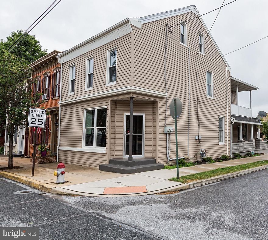 Welcome to this spacious, renovated home in the historic town of Columbia! Renovations include an updated kitchen, refinished hardwood floors throughout most of the home, and new paint throughout. A truly unique feature of this home is the business space in the front. On well traveled 3rd St near all the attractions of Columbia's downtown, the approximately 400 SF space was most recently used as a barbershop and is well situated for it's next small business. Fresh paint and other updates make this a pleasant, well lit space that's ready to go! Back in the main house, you'll find a pleasant living space off the kitchen. Moving upstairs, you'll find no lack in bedroom space. With a total of 3 large bedrooms and 2 smaller ones, plus a spacious lounge area beside the upper porch area, there's so much space for a row home, all with fresh, clean finishes. Outside, you'll be delighted by the spacious porch facing quiet Poplar St, and the historic neighboring buildings, as well as the backyard with plenty of room for entertaining. And for your convenience there are also two off street parking spaces in the rear, as well as street parking is practically always a breeze. All this is located just steps from the popular Northwest River trail, and boundless other recreational opportunities nearby. Live in the house and run your business out of the commercial space, have the commercial space help with your living expenses, or buy as an investment with a projected $2,500 per month in gross income. Don't miss this great opportunity!