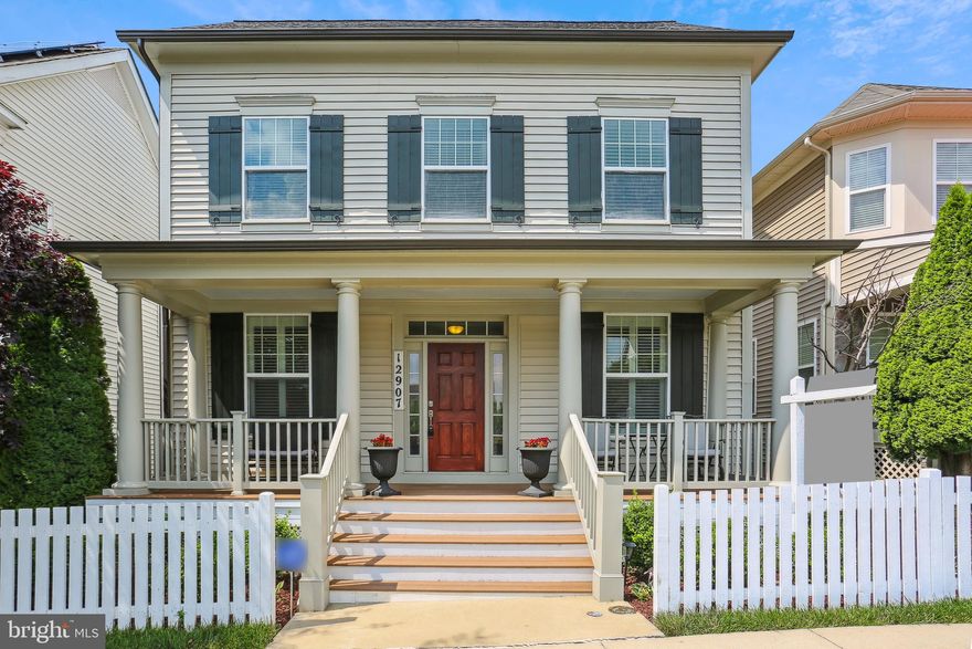 Welcome to this extraordinary home located in desirable Clarksburg Town Center. The welcoming front porch opens onto a main level featuring hardwoods floors and an open floorplan with large rooms filled with upgrades and abundant natural light. The kitchen is a chef's dream and perfect for entertaining, featuring a huge island, upgraded appliances, a custom backsplash, and upgraded lighting and fixtures. The large family room adjoins the kitchen and features a gas-burning fireplace. Custom shutters provide privacy while allowing ample natural light throughout. Gorgeous hardwoods extend into the upper level, which features a luxury primary suite with a beautifully upgraded en-suite full bath and two walk-in closets, the second bedroom with an en-suite full bath of its own, spacious third and fourth bedrooms, and an upgraded third full bath.  Highlights of the fully-finished lower level include a spectacular recreation area complete with a media room and custom bar area offering a private oasis for movie nights or gaming sessions, a big bonus room perfect for a home office, gym, or hobby space, and a fourth full bath. The detached garage offers convenience and additional storage space. The roof was replaced in November, ensuring peace of mind and added value. This impressive property also offers access to an array of incredible nearby amenities. Enjoy multiple swimming pools, the exercise room, sidewalks, and a fishing pier. Nature enthusiasts will appreciate the proximity to the new 66-acre Piedmont Woods Park, featuring a dog park, tennis and pickleball courts, basketball courts, and nature trails. Countless nearby dining, shopping, and entertainment options are right outside your door, as is quick access to commuter routes. Additionally, residents can take advantage of nearby recreational activities, such as the P.B. Dye Golf Course, Little Bennett Golf Course, Black Hill Regional Park, Butlers Orchard, vineyards, and more.