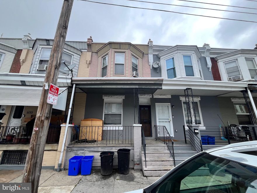 Welcome to this traditional Brick, Porch front, Row/Townhome in the heart of West Philly, conveniently located right off of 52nd & Market, which offers plenty of shopping and public transportation! Lovingly maintained by the Tenant, once you enter the foyer, you'll be impressed by the interior space this home offers. The open floor plan offers wood flooring in the Living room and Dining room, a grey tiled floor and cabinet Kitchen with a ceiling fan and white appliances, including gas range & hood. More convenience of a main level Laundry and half Bathroom, with exit to the rear fenced yard, with Central Air condenser. The lower level is huge, and offers plenty of storage with the potential to add even more living space, and includes a Rheem, gas hot water tank and a Gibson gas hot air furnace. The upper level accommodates with 3 spacious Bedrooms and a modern 3pc hallway Bathroom with stall shower. The current lease is valid through August 2025, so this is a great investment or your next home!