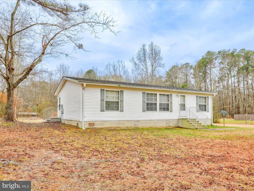 Come check out this move in ready property! You can either move right in and live comfortably on the sprawling 0.79 acres provided to you by this property. Or you can put in some sweat equity and bring this property up to 2024 standards and leave with a hefty profit! Enjoy the perks of living outside of city limits, such as the serene setting, lack of a water bill due to private septic and well, and no city taxes! While in a serene setting this property is only 17 minutes to Chincoteague, and only 6 minutes to all the basics Pocomoke provides such as Walmart, McDonald's, Lowes, and so much more! Come tour this property and see what a little TLC can do for this property!