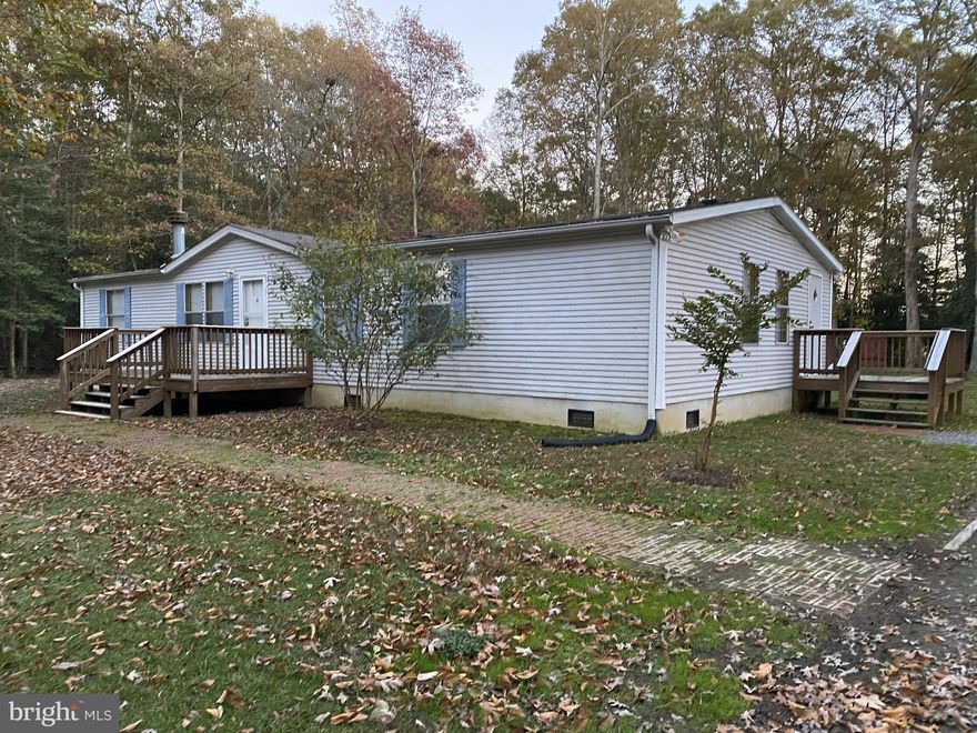 3 bedroom 2 bath double wide in King George located within 13 miles of Dahlgren Naval Base, and 18 miles from Fredericksburg. Home features large open kitchen, large yard for entertainment, and a porch to sit  back and relax on. Don't miss this opportunity!
