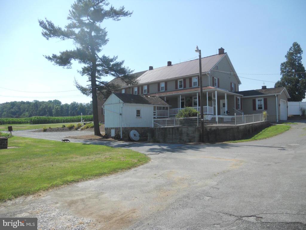 Extraordinary Farmette With The Stay At Home Business Built-In, Home Has 9 Bedrooms And 3 Baths. Or Keep It Divided Into 4 Units Allowing For Rentals. 100 Storage Spaces And 12 Acres To Farm Or Possibly Subdivide.
