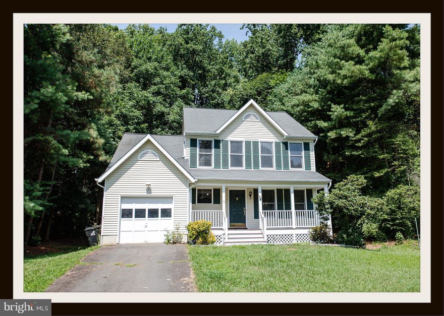 Great location in North Stafford.  Close to 95, commuter lots and Quantico!  NO HOA.  Cute colonial in a cul de sac on a 1/2-acre lot.  Clean and move in ready.  You'll want to put your personal touches on this sweet home!  This home has skylights, vaulted ceilings and loads of charm.  There is a lovely brick wood burning fireplace in the cozy family room just off the kitchen with pantry closet.  The family room also leads to your large deck to make family gatherings and entertaining easy.  The upstairs loft overlooks the family room below.  The primary bath has a dressing area and en-suite bath.  Two additional bedrooms and full bathroom complete the upstairs.  Full front porch and single car garage make this one you don’t want to miss.  Schedule your showing today.