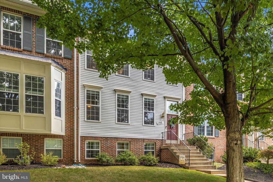 Welcome home to 7702 Battery Bend Way! This beautifully updated 4 bedroom 3 1/2 bathroom townhome is just what you've been searching for! The entry level of your home features a spacious living room with convenient guest half bath, kitchen with granite counters and stainless steel appliances, plus a dining area with access to your rear deck. The upper level of your home features your primary suite with private full bath, two additional bedrooms, and full hall bath. The fully finished lower level of your home offers a rec room with gas fireplace, bonus area, fourth bedroom, and full bath, plus access to your rear patio and fully fenced yard.  The home also comes with two reserved parking spaces! Within the community you'll find pools, parks, walking paths and so much more! Don't miss your chance to call this amazing house your very own!