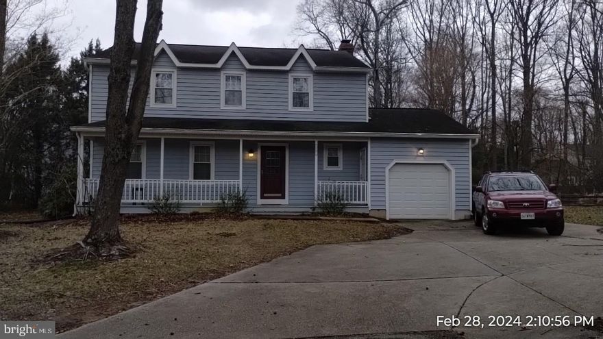 This spacious 4 bedroom home is just waiting for someone  to bring it back to its former glory. This home sits at the end of the block with only 4 houses other houses on the block.