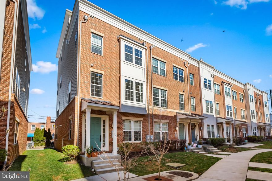 This Hampden gem end-of-group, 4-bedroom, 4-bathroom townhome is spacious and inviting, with three light-filled exposures and thoughtful, high-end amenities throughout. The home is ideally located - just one block from Hampden's "The Avenue," readily accessible to I-83 (and light rail), and steps from some of Baltimore's best restaurants and burgeoning craft brewery scene. Enjoy the expansive green space of nearby Roosevelt Park or take a stroll through the trails of Druid Hill Park, a short walk away. 

Enter the home from the private courtyard of Hampden Square to soaring ceilings and large double doors that invite you into the versatile first floor bedroom/office. On this entry level, access the dedicated full bath and attached two-car garage. Head upstairs to the airy, open, and light-filled main floor with a spacious living room featuring an integrated gas fireplace and custom built-ins. Adjacent is a balcony deck that is accessible for grilling. The living area flows into the large gourmet kitchen, outfitted with stainless steel appliances, gas stove, and a comfortable island with ample seating. Continue into the expansive dining area to complete this perfect-for-entertaining space.  

Head upstairs to where two bright and spacious bedrooms await, both featuring ensuite baths and custom walk-in closets for ultimate ease of living. Enjoy the convenience of a centrally located laundry room. Pass the hand-painted frame mural wall as you approach the top floor, where you will find an additional bedroom with a full bath as well as an entertaining space with a wet bar and wine refrigerator that opens onto a roof-top deck that is uniquely equipped to enjoy all seasons. The double-sided fireplace keeps the space cozy through winter, while the automatic retractable awning covers the deck with cooling shade through summer. Enjoy views across the Jones Falls to the old growth forest of Druid Hill Park and beyond.

Book a showing today to experience this standout home, combining convenience, luxury, and practicality all under one roof. Please stop by to envision enjoying the amenities of this home for yourself!