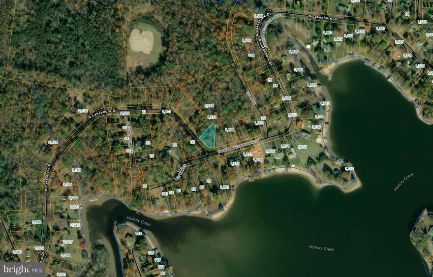 Build your dream home on this desirable corner lot in the gated waterfront community of Blue Ridge Shores. This build-ready lot offers excellent positioning and flexibility for home design while providing access to Lake Louisa with boating, fishing, swimming, and multiple sandy beach areas. Community amenities include a marina with boat slips and fuel access, tennis, pickleball and basketball courts, scenic walking trails, and a community center hosting year-round events. Enjoy lake-style living with paved roads and security, conveniently located near the Town of Gordonsville, Lake Anna State Park, and an easy drive to Charlottesville and Fredericksburg.