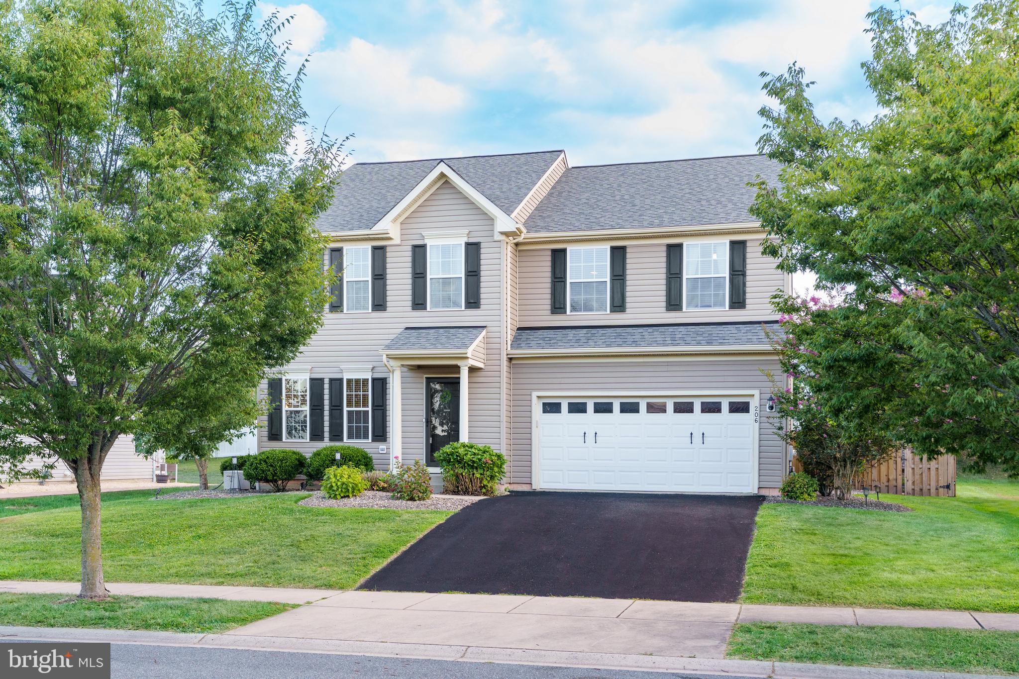 There's no place like home! Pride of ownership shows in this beautiful 4-bedroom colonial in Ridgely Forest that offers an open layout with hardwood floors, cozy carpeted areas, and a modern kitchen with 42" cabinets, a central island, and stainless-steel appliances. Enjoy entertaining in the separate dining room or relax in the family room featuring custom built-ins. A separate living room, a versatile bonus room perfect for an office, and a convenient half bathroom complete the main level. Upstairs, you'll find a spacious loft, a luxurious primary suite with two recently updated walk-in closets and a private bathroom boasting a soaking tub, walk-in shower, and dual vanity. Three additional bedrooms, a full bathroom with a tub/ shower, and a laundry room offer ample space and convenience. The unfinished basement is prepped to be finished with framed rooms and a bath rough-in, with walkout doors leading to the backyard. Step outside to a fenced backyard paradise with a spacious patio, stone fireplace, built-in grill, and integrated lighting. Additional patio space with a pergola provides the perfect setting for outdoor gatherings or relaxation. Recent home updates add peace of mind, including a water heater (2022), carpet (2022), appliances (2022-2023), wood fence (2024), EV-charger (2024), 50-year roof (2024), and updates to the landscaping/hardscaping (2025). Enjoy the neighborhood's amenities, including a clubhouse, community pool, splash pad, playground, dog park, and picnic area. Conveniently located close to major commuter routes and the charming town of North East, offering excellent shopping and dining options. Don’t miss the opportunity to make this beautiful home your own!