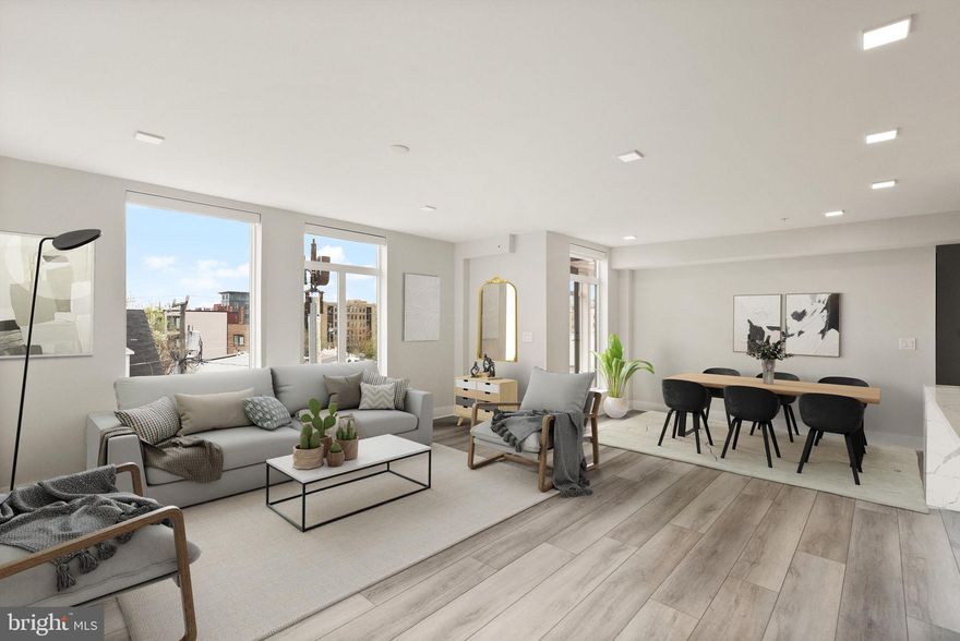 If you're looking for style, comfort, and convenience, you've found your new home. This brand new 2 bedroom, 2 bathroom luxury penthouse features top class finishes and over $60K in premium upgrades throughout. Step inside to discover an open-concept floor plan flooded with natural light and expansive windows equipped with motorized custom blinds. The kitchen is a chef's dream, loaded with stainless steel appliances, a spacious quartz waterfall island, oversized farmhouse sink, and plentiful cabinet space. The showstopper of this home is the enormous private wrap-around terrace. It's the perfect space to entertain, relax, or simply soak in the panoramic views. From coffee in the morning to cocktails at night, this outdoor space offers endless possibilities. The primary suite features a massive walk in closet, access to the terrace, and spa-like bathroom filled with matte black finishes, a double sink vanity, walk in shower, and illuminating LED lit mirrors. The second bedroom is also equipped with a vast walk in closet, and access to its own private balcony. The second full bathroom showcases beautiful tile to the ceiling, matte black finishes, LED lit mirror, and tub/shower combo offering the perfect blend of relaxation and functionality. Additional highlights include in-unit laundry and 2 assigned garage parking spaces. Take advantage of the building's amenities: gym,  courtyard with grill stations, as well as additional grill stations on the rooftop, concierge, and secure building access. Step outside and you're 2 blocks from the Braddock metro station, and steps away from the amazing shops and restaurants Old Town has to offer. Absolutely stunning. Move in ready. Unbeatable location. What are you waiting for? Schedule your showing today.