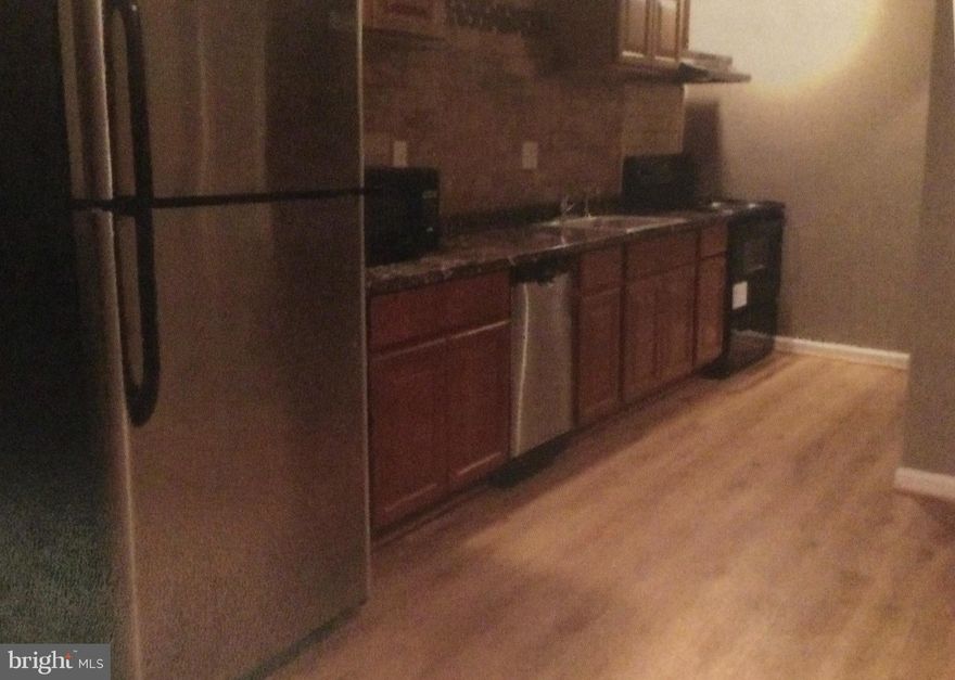 BASEMENT APARTMENT!! 
This is what your looking for,beautiful basement apartment. Fresh and clean with all the amenities and electricity and water included. Two bedrooms and full bathroom. Full kitchen with stove ,sink , refrigerator and freezer. Lots of cabinets and countertops space. Stackable washer and dryer. Large living space and private entrance for privacy. Street parking enough for two cars. The electric,water,internet and cable are included in rent. NO ACCESS TO ANY UPPER LEVELS. BASEMENT APARTMENT ONLY. 
Upper property is owner occupied.