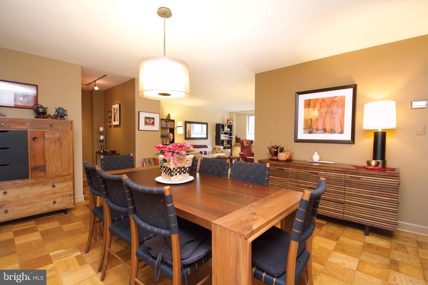 NEW Price Improved by $15K! Contact us for a virtual tour1This beautifully updated first floor unit is located in the heart of Bethesda. The spacious, open floor plan; boasts a freshly painted interior; gleaming parquet (hardwood) floors; kitchen with granite counters, standard appliances and lots of cabinetry; custom built-ins for added workspace/study; recessed lighting; 2 generously sized bedrooms including a master suite and ample storage space throughout. Condo fee includes all utilities (gas, water, heat, electricity).  Enjoy the resort style amenities also included: laundry facilities on every floor, outdoor swimming pool, 24-hour concierge desk, storage bins (first come/first served), party room, etc. Pet friendly building with 30lb max weight restrictions.  Conveniently located within one-mile of NIH, Walter Reed National Military Medical Center, Suburban Hospital, Harris Teeter, Bethesda Row for shopping, dining and entertainment. Near parks, trails, 2 Metro stations, Metrobus/Ride-On & more!