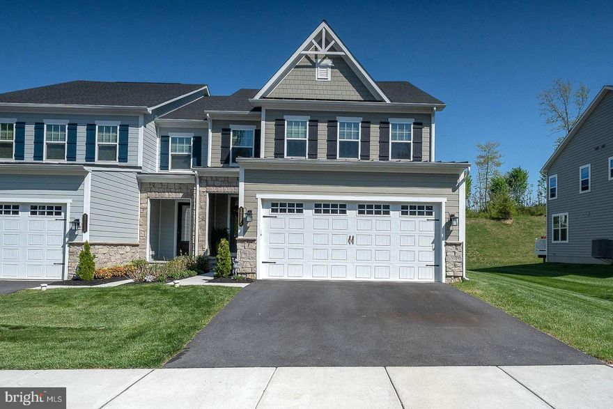 Nestled in the prestigious Greystone community, this exquisite twin home redefines luxury living with its impeccable design and high-end features. This residence seamlessly blends traditional architectural elegance with modern comforts, offering a lifestyle of sophistication and ease which offers over 3,500 square feet of thoughtfully designed living space, where every detail has been meticulously crafted. The heart of the home is the gourmet kitchen with modern crisp white cabinetry, beautiful quartz countertops, stainless steel appliances, gas cooktop, tile backsplash, generous island.  Sun-filled dining area and livng space offers an inviting setting relaxing and entertaining. The gas fireplace adds a touch of warmth, perfect for cozy evenings.  First floor office with french doorsand recessed lights, Mud Room with built-ins storage, Powder Rm., with closet complete this floor.  Ascend to second floor to the Owner's Luxury Suite, featuring a tray ceiling with custom trim, celing fan, walk-in closet and a spa-like bathroom with dual quartz vanity, water closet, luxurious walk-in shower with built-in bench and a generous walk-in closet.  Three additional bedrooms, full hall bathroom and laundry room complete this level.  This home provides ample space for relaxation and rejuvenation. The daylight, full finished basement is a versatile canvas, ready to be transformed into your dream entertainment area, home gym, or private retreat, media room with a full bathroom.  The exterior of the home is equally impressive, featuring a harmonious blend of vinyl siding and stone that exudes timeless charm. The attached garage, complete with a front entry and garage door opener, ensures convenience and security, while the additional driveway space accommodates guests with ease. As a resident of Greystone, you'll enjoy exclusive access to beautifully maintained common areas, lawn maintenance, and snow removal, allowing you to spend more time enjoying the jog/walk path that meanders through the community. This is not just a home; it's a lifestyle that prioritizes leisure and tranquility. Imagine sipping your morning coffee on your private deck, surrounded by the serene beauty of open space. This property is more than just a residence; it's an invitation to experience a life of luxury and comfort in a vibrant community. Minutes to the charming downtown West Chester with parks, boutiques, restaurants plus close to Chester County Hospital, YMCA, Major Roads and everyday conviences.  Don't miss the opportunity to make this stunning home your own and embrace the exclusive lifestyle that awaits you in Greystone. Schedule your private tour today and step into a world where elegance meets modern living.