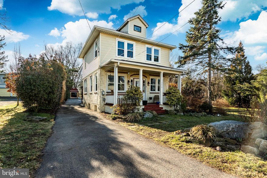 Nestled on a beautifully landscaped lot that feels like your own private arboretum, this charming farmhouse-style home in Whitemarsh Township offers a rare combination of character, setting, and convenience. Located within the highly regarded Colonial School District, the property provides a peaceful retreat while remaining just minutes from the PA Turnpike, Northeast Extension, and the Blue Route.

Inside, the home showcases timeless craftsmanship with stunning hardwood floors, rich original wood trim, built-in shelving, and a classic staircase that highlights the quality and character rarely found in today’s construction. The warm and inviting living spaces are filled with natural light and offer the perfect blend of historic charm and everyday functionality.

The home features three bedrooms and thoughtfully arranged living areas that create a comfortable and welcoming atmosphere throughout. Whether relaxing in the living room, hosting friends in the dining area, or enjoying a quiet evening cocktail in the charming parlor room, the interior spaces reflect the warmth and character that make farmhouse-style homes so special.

Surrounded by mature trees and lush landscaping, the grounds provide exceptional privacy and a setting that feels far removed from the bustle of everyday life, yet remains incredibly convenient for commuting and access to nearby amenities.

A truly unique opportunity to own a character-filled home on a beautiful property in one of Montgomery County’s most desirable locations.