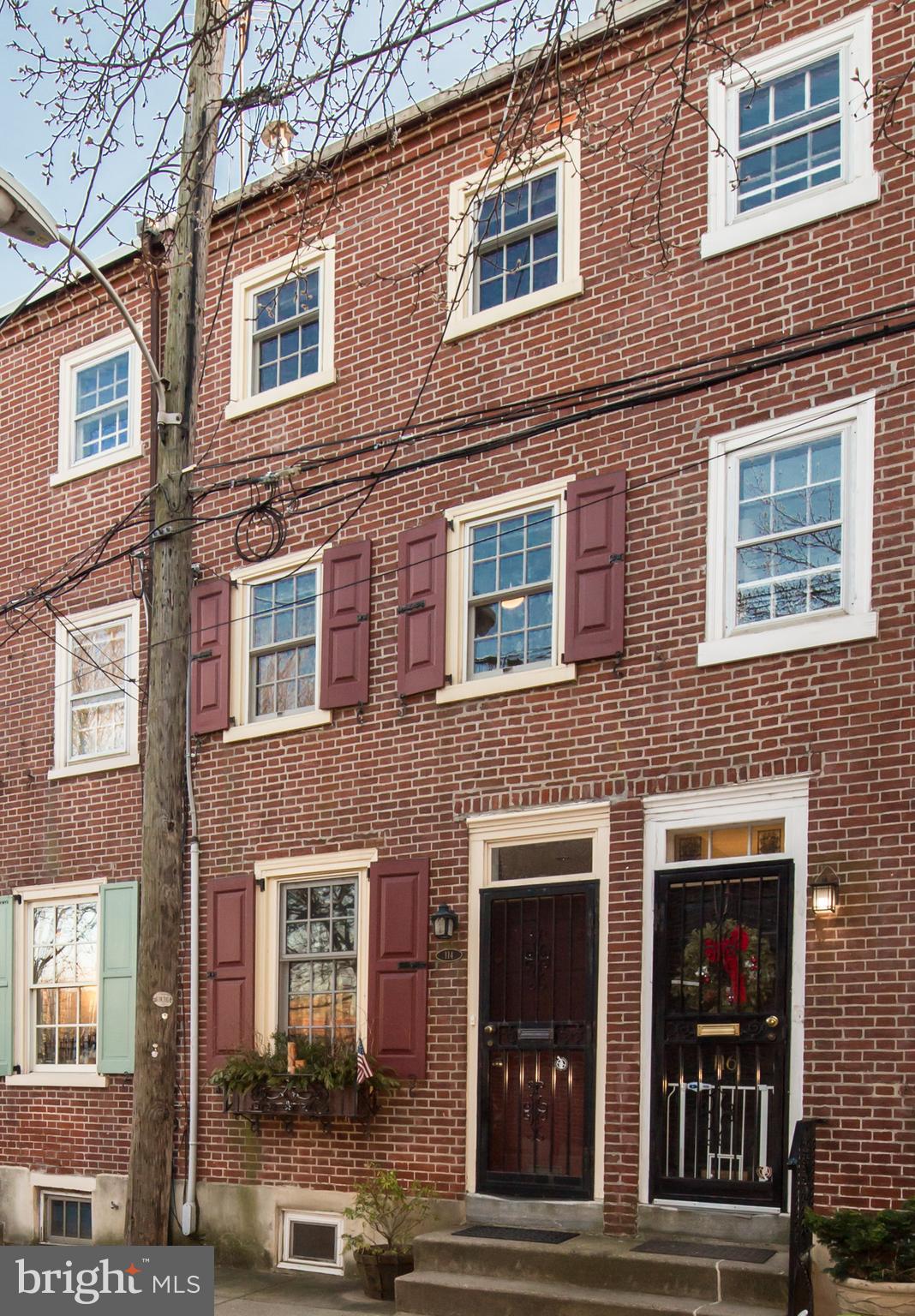 Contact Lauren for video tour! Abundant charm and great curb appeal! Don't miss this absolutely incredible 2 bedroom 2 bath home with finished basement and central air on a wonderful friendly Queen Village block! Enter into the charming and bright living room with working fireplace and beautiful hardwood floors throughout. Designer kitchen with gorgeous granite counters/ backsplash, tons of cabinet space, wonderful pantry, and stainless steel appliances. Glass door with new Anderson screen door to lovely garden perfect for your next BBQ. Incredible additional living space in the fantastic finished basement with recessed lighting and built in shelving. Separate laundry room with full size washer/ dryer and storage. Straight stairs to the lovely 2nd floor bedroom. Great hall bath with tub. Fantastic 3rd floor master bedroom suite with custom closets and beautiful bright spa bathroom with extra large glass shower and double vanity. A wonderful skylight floods the halls with light. This home is a must see!