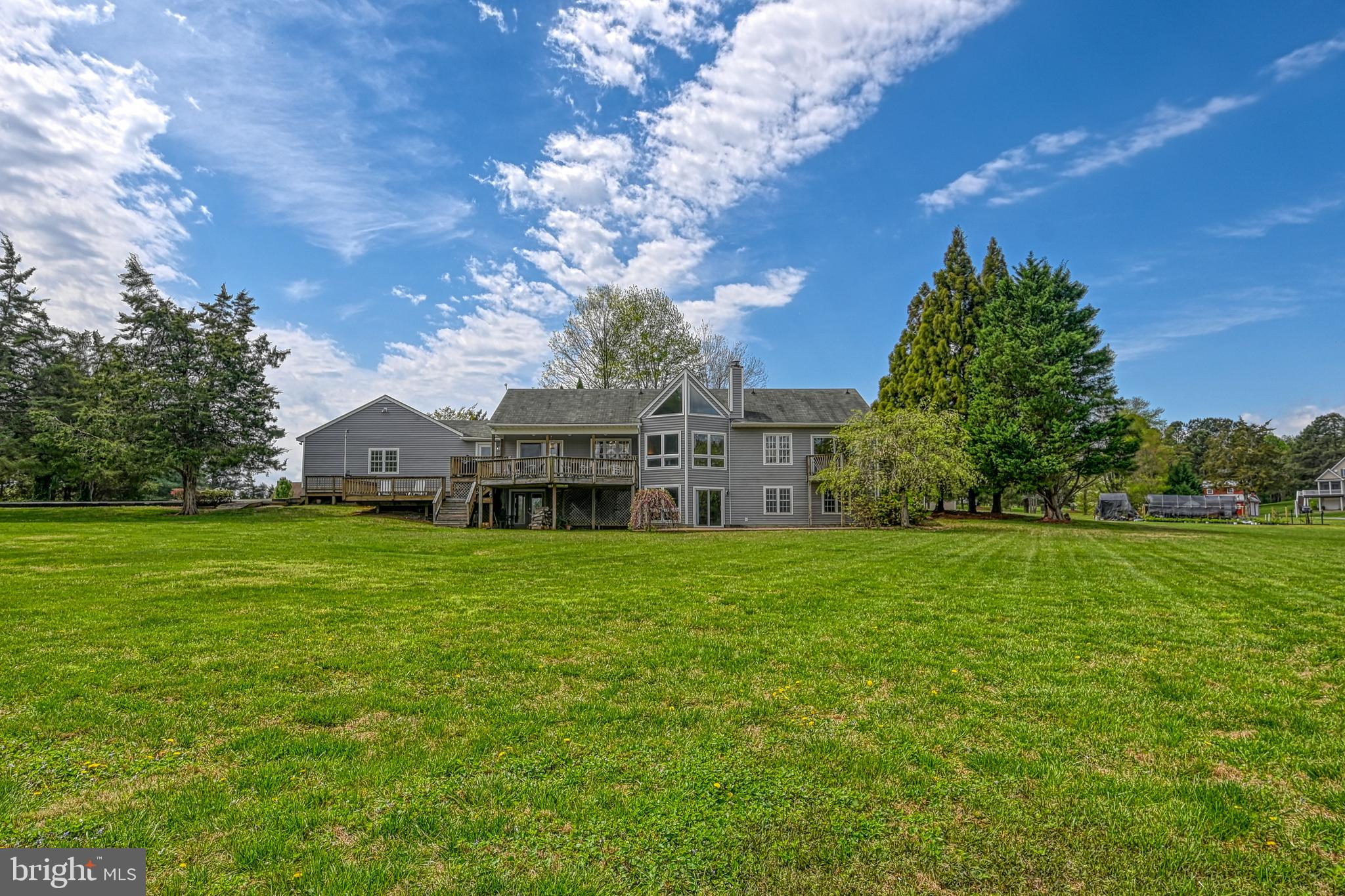 Welcome to this 3-bedroom 2.5 bath waterfront home is gracefully positioned on the shores of Lake Anna. Water Views from almost every room. The inviting living room boasts a double-sided gas fireplace (other side is in the master suite), creating a warm and stylish ambiance for gathering with friends and family. The master has a full bathroom with separate Tub from the shower, a spacious cozy sitting area, perfect for relaxation, The kitchen offers plenty of open space with a gas stove, huge pantry. The rear deck offers different areas for use and a gas line ready to fire up your grill. showcasing breathtaking views of the lake -an entertainer's dream. On demand, a Rinna Hot water heater. Venture downstairs to discover a spacious space for your living room and enjoy Playing some pool, 2 bedrooms facing the lake offer stunning views as well. Spacious unfinished area offers so many unique possibilities for expansion or further customization. Embrace the serenity and unique charm of this waterfront sanctuary, an unparalleled opportunity to savor the Lake living lifestyle. Outside, the dock is the perfect place to enjoy fishing or kayaking. Embrace the serenity and unique charm of this waterfront sanctuary. Watch the Annual Lake Anna Fireworks from your own back yard