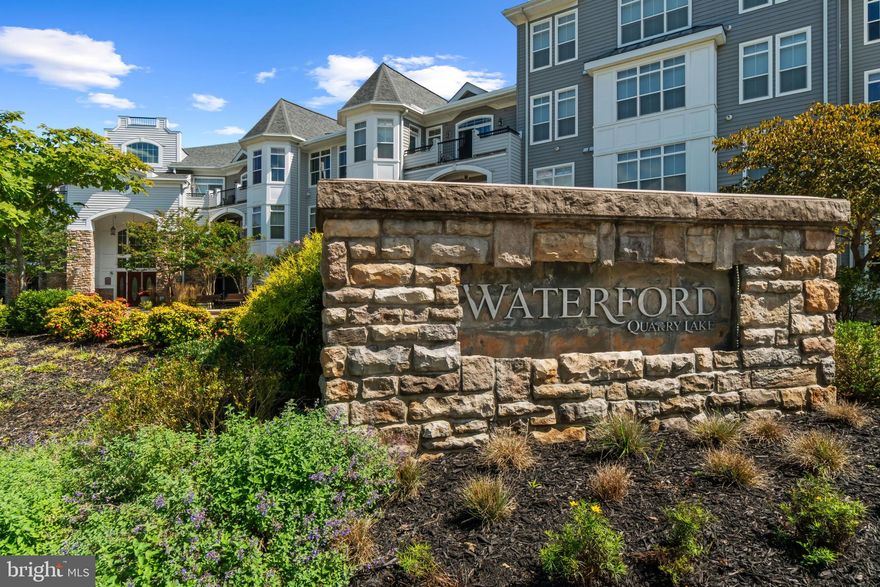 One of a kind Quarry Lakes condo!! Two spacious bedrooms at opposite ends of the unit - this 1st floor condo has front to back layout - a wonderful study/office off the grand entry foyer.  Laundry room off huge 2nd bedroom (with sitting area).  Kitchen has stainless steel appliances, wall oven and micro- wave ,   granite countertops, engineered redwood floors, 9" ceilings +++ Living room with track lighting,  and crown molding throughout .  The Primary bedroom is a must see - bath with a separate soaking tub and shower,  walk-in closet and another double closet. Private balcony with great views. This unit comes with two deeded garage parking spaces, and a very nice storage closet,  all together.