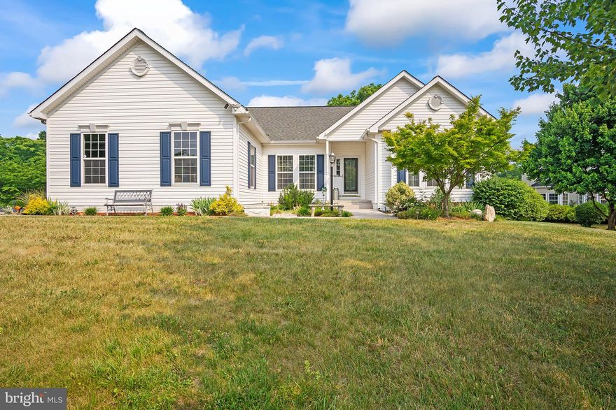 Situated on a corner lot in the Fieldstone community, this meticulously maintained home offers one-level living and will captivate your attention and admiration.  A welcoming foyer leads into an open living room boasting of cathedral ceilings, warm wall colors, and lots of natural lighting. The front office creates a convenient space to work from home.  Hard flooring throughout makes cleaning a breeze.  The family room and adjoining four-seasons room suggests a lovely place to curl up with a book.   The kitchen’s open concept accommodates lots of action and allows for entertaining while cooking.    Granite countertops and attractive appliances give the kitchen a modern look.  The owner’s suite offers cathedral ceilings, lots of natural light and neutral wall colors.  Finished basement, complete with a half bath that is roughed in for a full bath conversion, cozy fireplace, and lots of open space is the perfect place to entertain or set up a private gym.  Workshop potential or lots of extra storage space can be utilized in the unfinished section. Outside, slate and trex decking leads to a saltwater pool, surrounded by mature landscaping.  Relax on the covered lower patio or entertain in the spacious back and side yard.  Roof is only 8 years old. Schedule your private tour today!