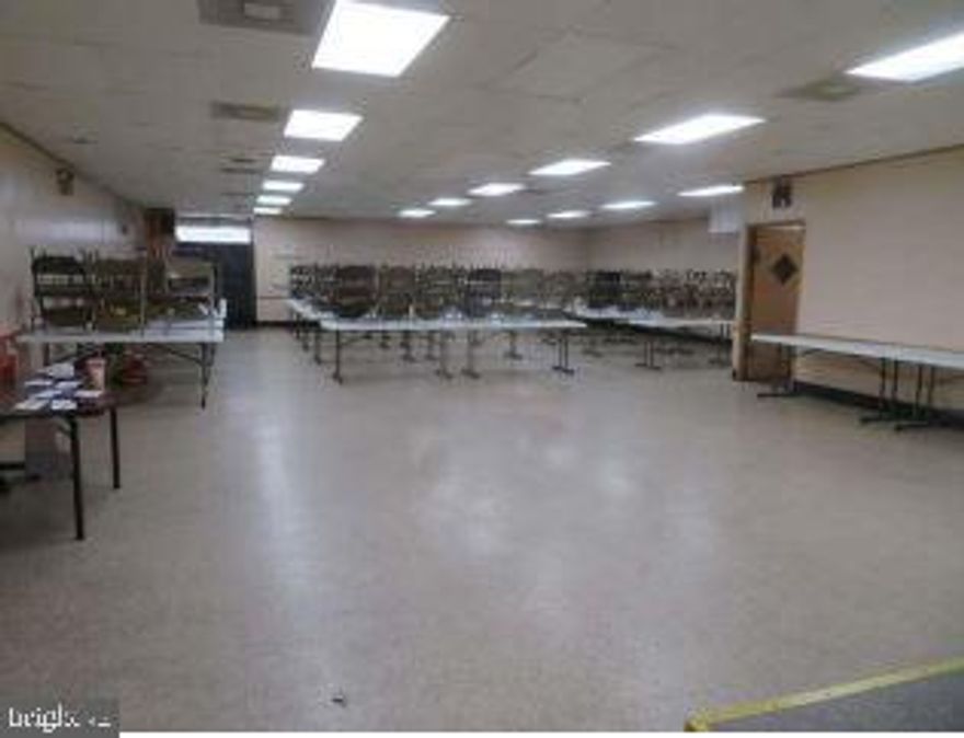 BACK ON THE MARKET, FINANCING FELL THROUGH AND PRICED TO SELL!! Financing fell through for original buyer...Dynamic opportunity for the savvy investor! Former Odd Fellows Lodge with 6400 square feet of finished space above level and 3200 square feet of finished space on the lower level.  Main, upper and lower levels offer spacious meeting rooms, mens and womens bathrooms and extensive closet space. The lower level and main level have commercial kitchens. Upper level has a large assortment of individual, private offices.  There are 3 adjoined lots which offer parking for up to 120 cars. This property is strongly enhanced by the access to public transportation and primary arterial roadways, specifically, I95 which is 5 minutes away.  Zoning is RT. (Please see docs