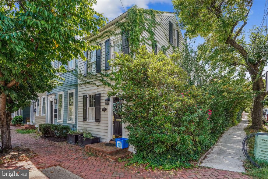Located in the heart of Old Town, this exceptional home offers over 2000 square feet, spanning three levels of thoughtfully designed living space. The inviting primary suite features a Juliet balcony, a luxurious soaking tub, and ample closet space.
The main level boasts sun-filled living areas and a chefs-like kitchen, ideal for both everyday living and entertaining. Step outside to a lush English garden, perfect for outdoor gatherings, and enjoy the convenience of a private EV charger.
Unbeatable location just steps to King Street’s renowned shops, dining, and waterfront. Commuters will appreciate the close proximity to King Street Metro, major roadways including I-495 and the GW Parkway, and easy access to military installations such as the Pentagon and Fort Belvoir.
This home combines historic character, modern amenities, and an unparalleled location, an ideal rental opportunity in one of Northern Virginia’s most sought-after neighborhoods.  ****OWNERS ARE WILLING TO INSTALL WASHER AND DRYER IF NEEDED****