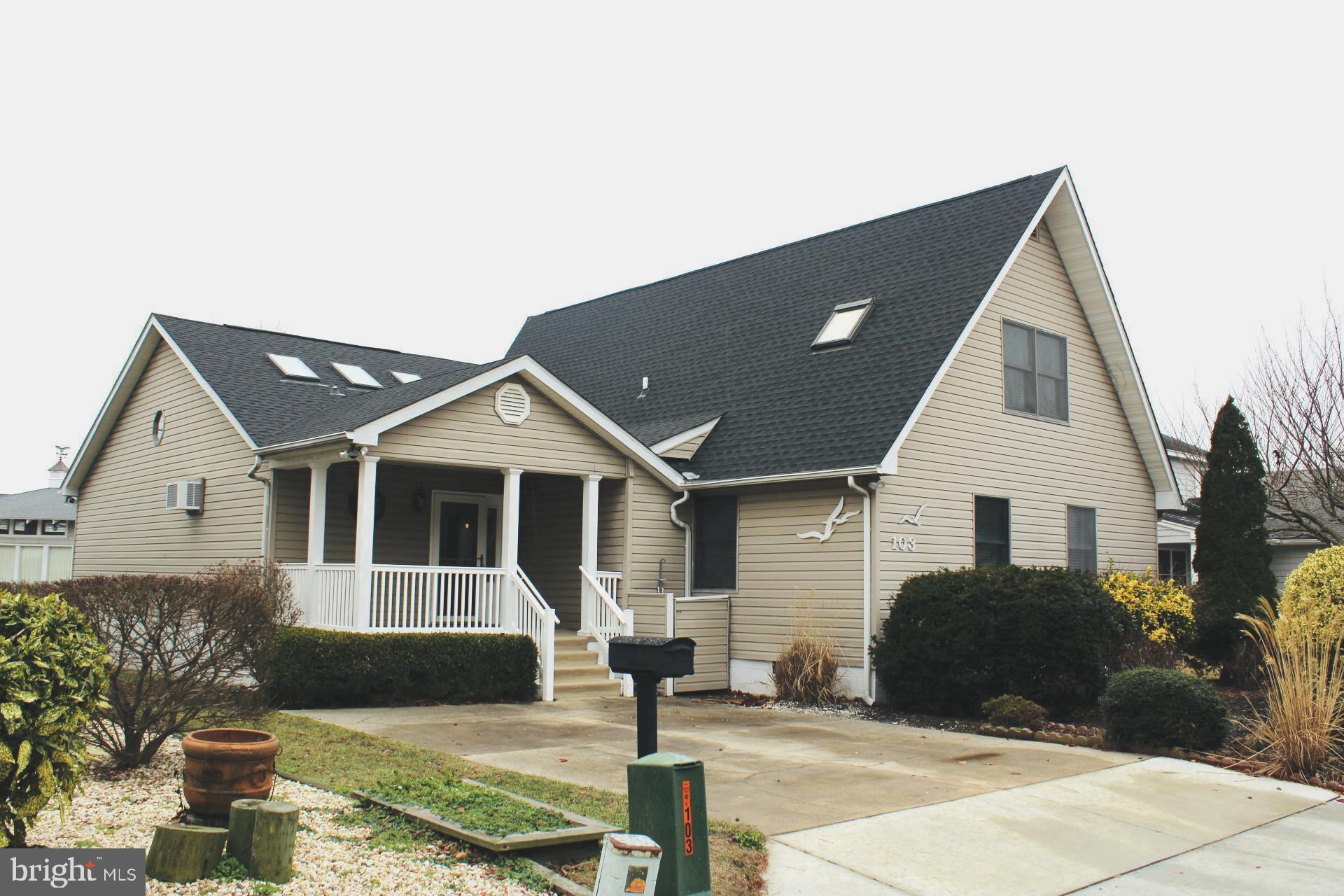 Located on the tranquil waters of Ocean City, MD, 103 Channel Buoy Road is a beautifully designed 4-bedroom, 3-bath single-family home offering both comfort and style. This waterfront property features a brand-new pier and boat dock overlooking the canal, perfect for enjoying outdoor moments with family and friends. Just a five-minute walk from the beach, the home is ideally situated for those seeking the ultimate coastal lifestyle. Inside, the polished faux wood beam high ceilings and modern skylights create a bright and inviting atmosphere, while the gleaming polished wooden floors add warmth and elegance. Architectural details, such as a striking wall painting, add character to the space. In addition, this property boasts a newly installed roof, providing lasting durability and peace of mind. The property also includes a well-maintained shed, offering convenient storage for outdoor equipment or recreational gear. This property blends modern amenities with timeless charm, making it a true gem by the water.