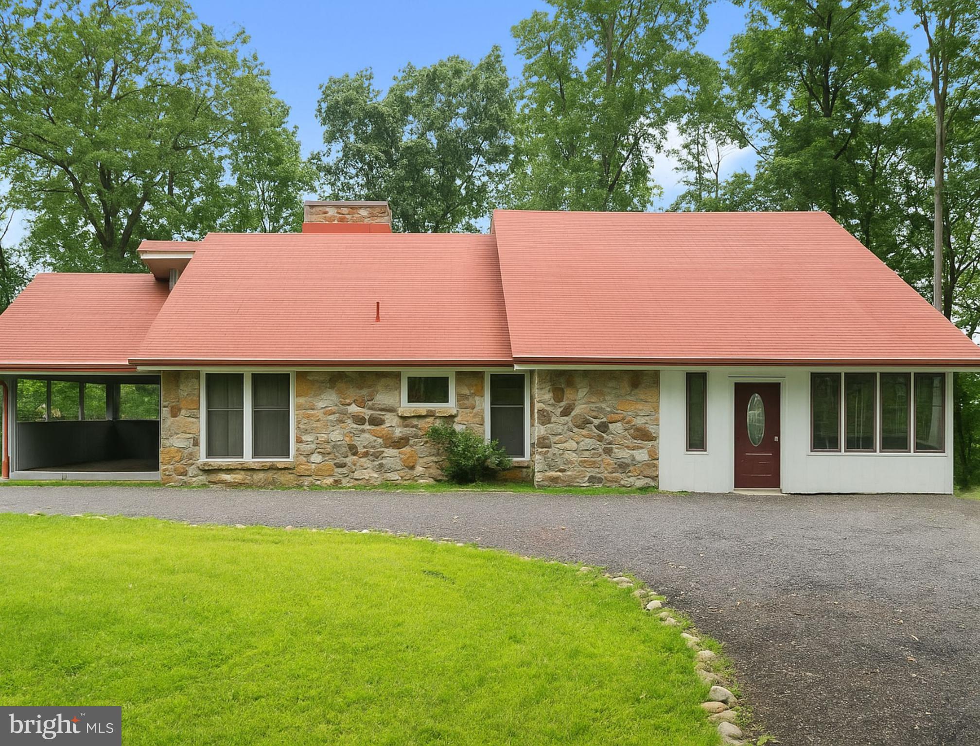 Set on five private acres zoned for horses, this updated home offers rustic charm, modern upgrades, and versatile use in a peaceful yet accessible location. A covered front porch and bright sunroom welcome you inside, where wood and LVP flooring complement a striking two-story stone fireplace in the main living area.
The fully remodeled kitchen is designed for both daily living and entertaining. Two main-level bedrooms each feature en suite baths, creating an ideal layout for guests, multi-generational living, or a potential short-term rental. The finished walkout basement adds a large bedroom, full bath, cozy wood stove, and additional living space.
Major updates in 2023 include a new septic system, upgraded electrical, new well pump, and five new mini-split units for year-round comfort. The detached garage with a new roof offers extra space for storage, hobbies, or a workshop.
With open land for horses, gardening, or simply enjoying the outdoors, this property is perfect as a full-time residence, weekend retreat, or investment opportunity. All just minutes from shopping, Route 7, and I-81.