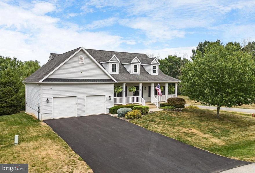 This gorgeous 3,500 sf+ Charles Town cape cod is a true standout! Situated on a corner lot in a friendly community not far from the conveniences of Rt. 340 and with quick access to Rt. 9, this beautiful residence has been tastefully updated and meticulously maintained. The main floor owner’s suite will draw you in, featuring high ceilings, attractive light fixtures, his/her closets, and an exquisitely renovated bathroom featuring a freestanding soaking tub, huge tile shower, and lots of natural light. Consistent and practical LVP flooring carries through the entire open-concept main floor with radiant heating for added comfort. The eat-in kitchen has hard-to-find gas cooking, stainless steel appliances, and an island with additional seating that opens to the cozy family room with gas fireplace. An adjacent dining room provides plenty of space for gatherings or could be converted to a multi-use flex space. Upstairs are two additional bedrooms with LVP flooring and a full bath cooled by a brand new HVAC system. The lower level affords office, recreation, and storage space plus another half bath to complete this home’s interior. Outside, you’ll enjoy a new Trex deck, private yard with koi pond, manicured landscaping, storage shed, and inviting front porch. There’s also a 2-car garage,  invisible fence, central vacuum, and recently sealed driveway. Plus the mailboxes and bus stop are right next door. You'll want to move right into this refined and spacious home while you have the chance!