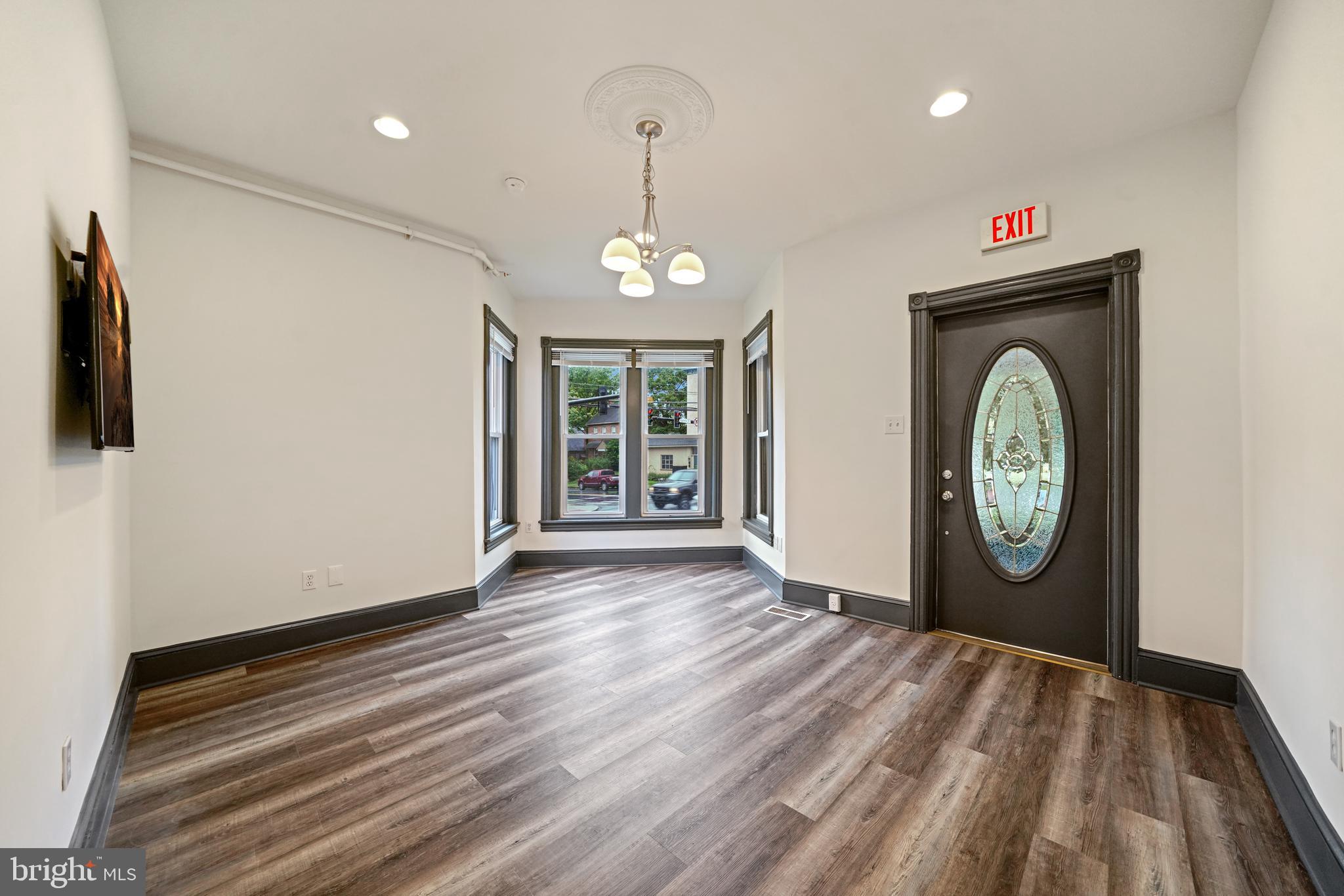 Recently renovated apartment in the heart of Kennett Square Boro with parking! Apartment includes hardwood floors, electric range, microwave, dishwasher, refrigerator, and 2 mounted flat screen TVs that are Wi-Fi enabled. Tenant pays $250 Utility Fee to cover WiFi, Water/Sewer, Property Maintenance, Security Cameras and Fire Safety Monitoring System. Electricity/Gas service to be paid by tenant in tenant's name. All Units include window shades. Abundant recessed lighting. Bathroom has step-in shower (no tub). Building has security camera coverage of all parking and common areas. Building has newer coin op washer/dryer in basement. Basement Storage Units are available. RentSpree application required ($39.99 paid to RentSpree.) Utilizes a soft credit pull. First, Last and Deposit due at lease signing. Tenant pays electric and must show proof of renters insurance. 1 dog with landlord review. No cats.