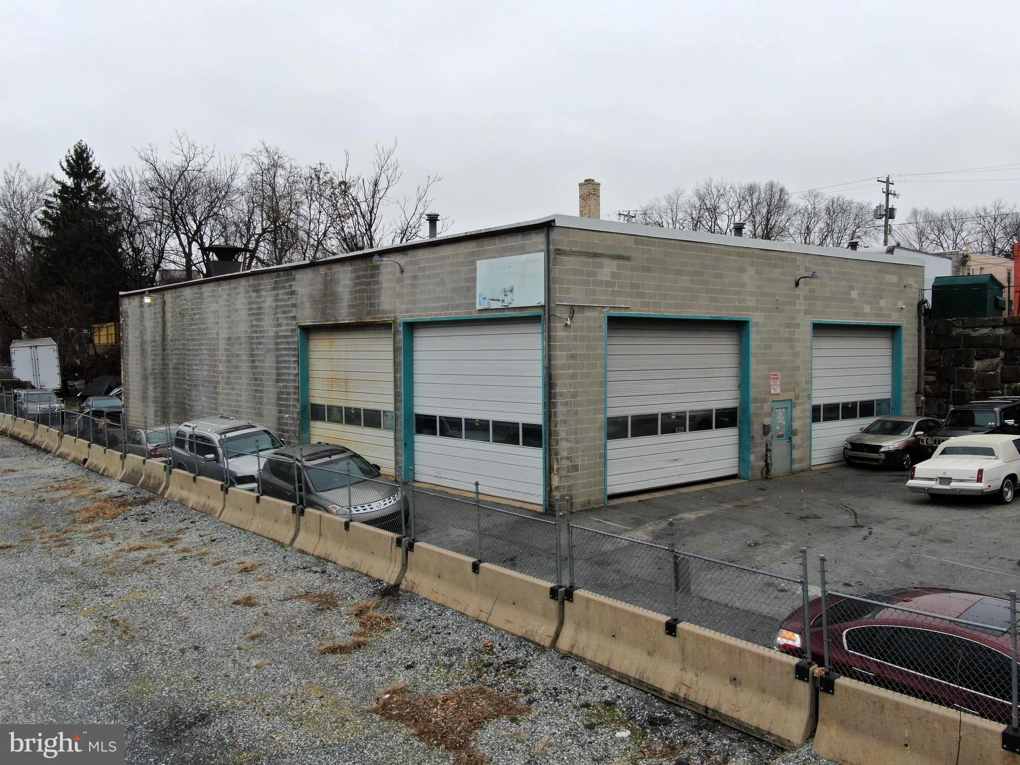 If you’re seeking a commercial property to start or expand your business, this impressive 6,000 sq ft automotive garage offers unparalleled potential! Thoughtfully designed to accommodate a range of operations, the garage features five spacious bay doors, allowing for versatile layouts to service both vehicles and trucks. Enhance your capabilities with three car lifts and a professional-grade paint booth—ideal for bodywork and detailing services. This facility comes equipped with five efficient heating units—three gas and two waste oil heaters—ensuring year-round comfort and productivity. Additionally, the property is powered by a robust 3-phase electrical system, providing ample power for lifts, machinery, and power tools. Situated in a prime, high-traffic area, this space offers exceptional client potential and business growth opportunities.