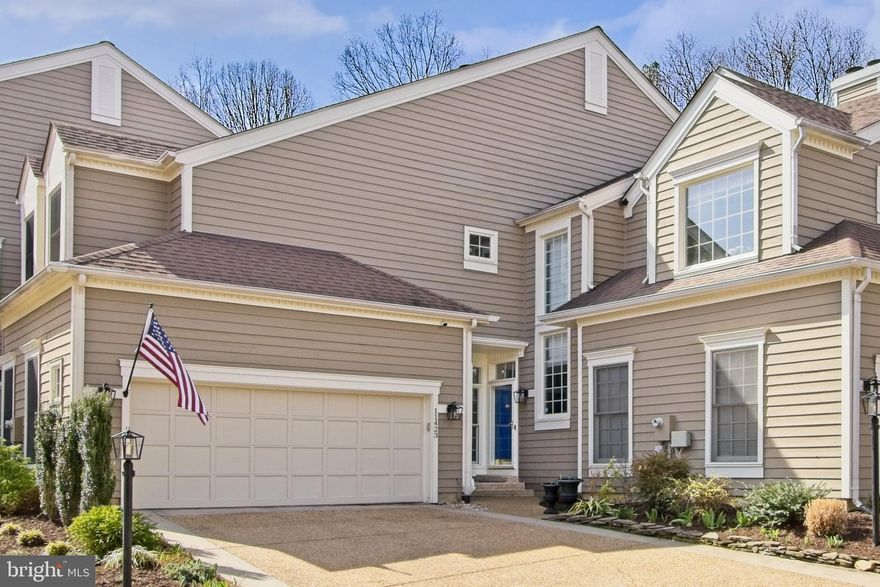 Welcome to this fabulous home located in Timberview Cluster, one of Reston's most sought-after clusters.  From the moment you enter this gorgeous home, you will discover the perfect blend of modern technology, designer upgrades and serene surroundings in this beautifully enhanced Z-lot townhome, offering rear yard privacy.  Nestled on a quiet cul de sac among lush trees and nature, this home offers a tranquil retreat just minutes from Reston Town Center, Dulles Airport and major tech hubs.  Enter the two-story foyer and living room and enjoy the built-in, custom display cabinet (2020) with LED lighting.  A corner, wood-burning fireplace, offers warmth and ambiance.  The glass patio door leads to the rear deck, and privacy fenced patio.   A separate dining room offers a large window space and an amazing, contemporary lighting fixture from Arhaus, all surrounded by designer grasscloth for texture and sophistication.   The 6 month-old customized powder room includes high-end finishes with a Toto bidet toilet for comfort.  The kitchen includes soft-close kitchen cabinets with 42" upper cabinets, roll-outs and a lazy susan, granite countertops, granite bar top, a custom pantry, stainless refrigerator purchased in 2024 and a stainless dishwasher new in 2023.  The bar stools convey.  The bay-windowed table space, beautifully lit by another contemporary Arhaus fixture, looks out to the rear yard, where a spacious patio and deck extend the living area for great outdoor dining.  Notice the amazing skylights providing natural light as you ascend to the upper level.  A loft area is an ideal space for a home office or a reading nook with built-in cabinetry and another beautiful Arhaus ceiling fixture.  Double doors lead to the  primary suite, which offers a spacious, customized, walk-in closet (2021), a  large primary bathroom. featuring double sinks and a large steam shower.  The convenient laundry room, entered by double doors in the hallway, includes windows for added light.  The second bedroom suite includes a private, full bathroom, and features a cathedral ceiling with a ceiling fan (2021).  Two large dormer windows and a full-wall customized closet complete the second bedroom.  The lower level offers a rec room with a corner, wood-burning fireplace.  The recently (2021) custom-built wet bar offers dual refrigerators to accommodate two temperatures, glass fronted upper cabinets with special contemporary lighting and a granite top.  The den features a brand new ceiling fan and a spacious custom closet.  The full bath is nearby with a tub/shower combination.  The double car garage also offers a universal car charging station and a row of lights over the garage door, allow you to celebrate all holidays with your choice of color.  This special home is located in a prime location with miles of walking trails,  a pool and tennis courts nearby and North Point Village Center a couple of minutes away offering stores, restaurants, groceries and a wine shop.  Reston's Town Center with outdoor concerts in summer, ice skating in winter, a theatre, restaurants and shops is just minutes away.  And, we have four lakes, over 50 miles of scenic walking trails, many community pools and tennis courts, two Reston Community Centers and many green spaces to promote our founder, Bob Simon's, Live, Work and Play ethic.  Reston Association's annual fee of $848.00 covers all these wonderful extras!  If your destination is DC or Dulles Airport, there are many easy ways to drive or to access Metro.