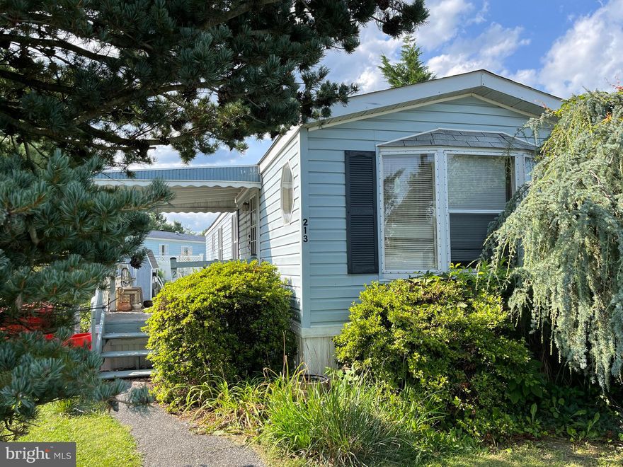 Spacious 2 bedroom 1 bath Mobile home on a lush lot with large deck and shed awaiting your personal touches.  Add some updates and make it yours.
NEW HEATER INSTALLED TODAY 10-18-2023