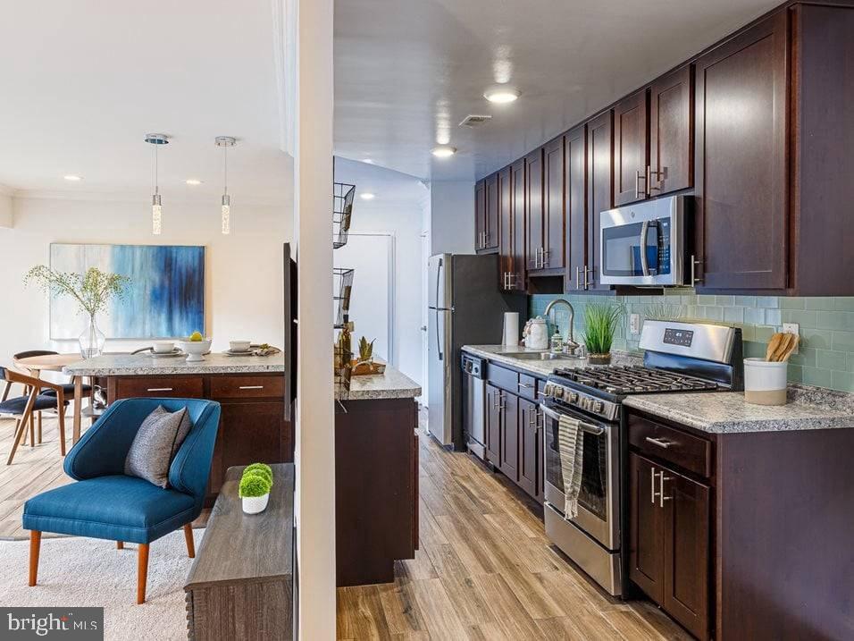 Seeking brighter days? Your search ends here. Merrifield at Dunn Loring Station presents outstanding, roomy apartments with one, two, or three bedrooms, each featuring its own private balcony or patio. . Enjoy high-speed fiber optic internet wired in each apartment, perfect for streaming, relaxing, or telecommuting. Steps from the Dunn Loring/Merrifield Metro Station, Merrifield at Dunn Loring Station Apartments places you a stone's throw from the Mosaic District, home to a variety of shops, relaxed yet stylish eateries, and the acclaimed Angelika Film Center. Located in the highly esteemed Fairfax County School District, the community offers convenient on-site school bus services. Residents have access to a fully equipped Fitness Center, two tennis courts, a gleaming swimming pool, a sand volleyball court, and a full basketball court. Enjoy a picnic in our Pine Grove or engage in a game of Chess in our outdoor Games Commons. Spread across thirty-five acres of verdant, meticulously landscaped grounds, our community provides the openness you crave without compromising on metropolitan conveniences. Contact us to arrange a viewing of our expansive apartments, perfectly suited for your Work From Home lifestyle.