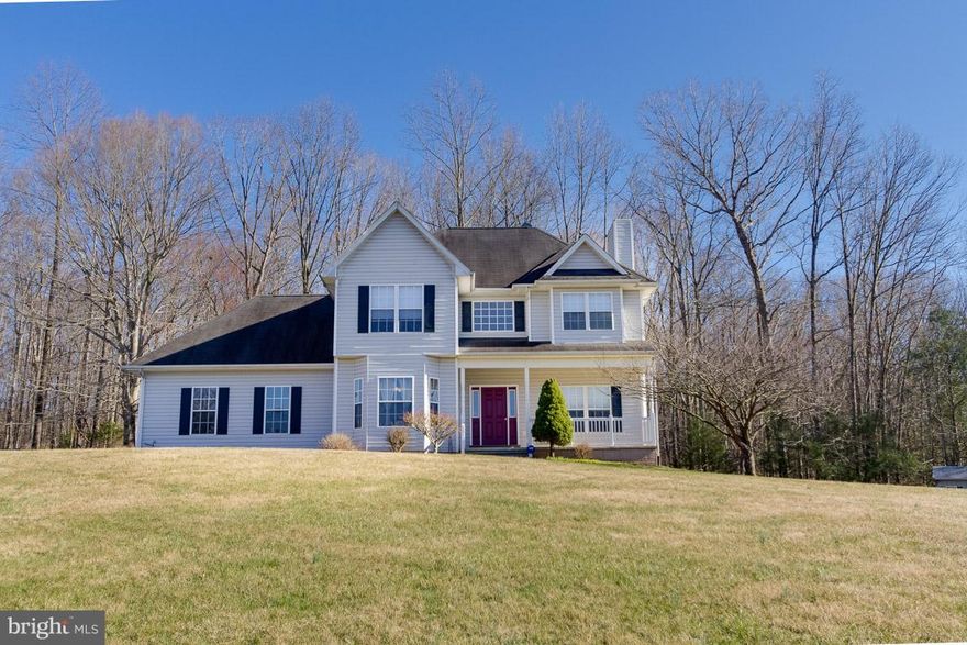 Gracious Custom Well Maintained Colonial   on 4 Beautiful Acres in Windy Hill - 3BR'S  - 3 1/2 Baths - Hardwoods on Main Level - Kitchen Updated with SS Appliances - Quartz Counters  SGD'S to Trex Deck -  Gas Logs in Great Room -Large Rec Rm& Workout Rm Gas Heat in Main Level-  New HVAC in Upper Level -  Outside Brick Oven & Brick Fire Pitt convey -  Access to 7 Acre Lake for Fishing & Picnic Area