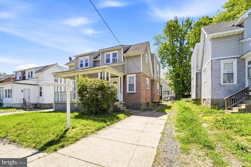 Welcome home!  This twin home is nestled on a culdesac block, with a private driveway that can fit at least three cars with ease, a front and rear covered porch, and a huge, fenced back yard.  The front door ushers you into the first floor that's newly renovated with new flooring, ceiling fans/lighting, newly installed window treatments, and fresh paint.  The kitchen tile is newly installed, and a brand new gas stove.  Original hardwood steps lead to the 2nd level where the new floors and fresh paint continues throughout the hall and bedrooms; and a newly renovated full bathroom.  There is a full basement with inside and outside access, and endless possibiities to make it your own. Also included is a newer hot water heater, newer heating system, and two AC  window units.