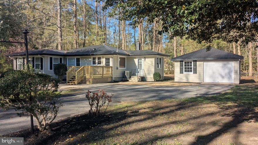 Fantastic opportunity to own a home in a sought-after beach-privilege community!

Enjoy access to beautiful beaches, a convenient boat ramp, and relaxing waterfront play areas along the scenic Patuxent River—perfect for boating, fishing, or simply unwinding by the water.

Great corner lot with ample parking, oversized garage and storage area for your boat or RV 

Home is well maintained and is  truly move-in ready, featuring a durable metal roof, newer HVAC system, brand-new appliances, fresh paint, and new carpet in the bedrooms. Step outside to a brand-new deck—ideal for entertaining or enjoying peaceful evenings around fire-pit.

Additional updates include a new septic system with two 2,000-gallon holding tanks, offering added peace of mind.

Whether you're looking for a full-time residence, weekend getaway, or investment property, this home checks all the boxes.

Don’t miss out—call John today for details and access!