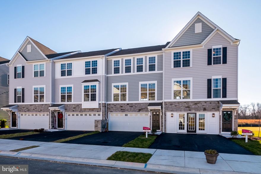 Amazing Opportunity with New Castle County Workforce Program!
Don't miss out on this spacious, reduced garage townhome offering incredible value. The Dewey model boasts 1,830 square feet across three above-ground levels.
On the main floor, enjoy 9' ceilings and an open-concept kitchen and café area, complete with stainless steel appliances, granite countertops, gas cooking, and a built-in microwave. Step outside to the adjacent deck for a breath of fresh air. The spacious Great Room is just off the kitchen, perfect for relaxing or entertaining.
Upstairs, the owner's suite features an en-suite bath and walk-in closet. Two additional bedrooms share easy access to the second full bath.
The partially finished lower level provides extra living space with sliding glass doors that lead to the outside, plus rough-in plumbing for a future powder room. The two-car garage offers ample space.
Located in the sought-after Appoquinimink School District, The Preserve townhomes back up to scenic open space. You'll also have the luxury of your own yard!
Note: Income limits apply—please contact the sales office for details. Home is under construction, and photos may represent a similar or furnished model.