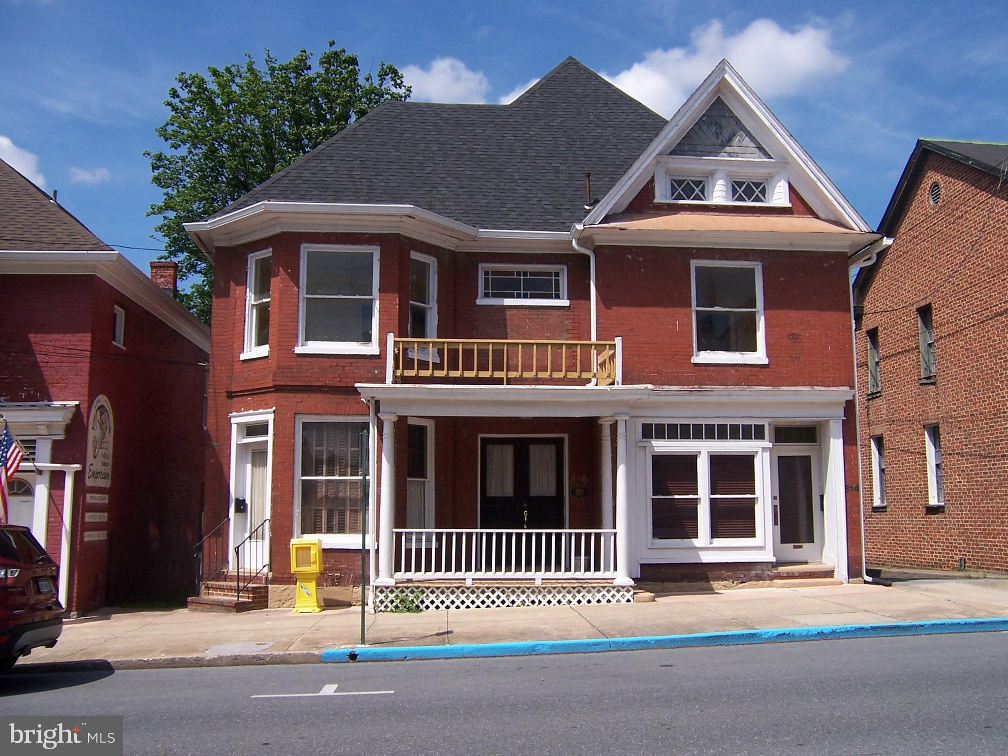 LARGE BRICK OFFICE BUILDING IN DOWNTOWN LOCATION AND PRIVATE PARKING LOT ON SITE 8- 10 CAR PARKING WITH EXTRA ROOM CLOSE TO BOTH COURT HOUSES COUNTRY GOVERMENT COMPLEX -4 FLOORS OF SPACE -2 FLOORS OF OFFICES ,HARDWOOD FLOORS-CARPET-VINIL AND WOOD. 3 MAILING ADDRESS- NEW PAINT AND CARPET JUST ADDED LAST TENANT STAYED 35 YEARS- 1 PRIVATE APT IN BACK-3 KITCHEN WITH APPLIANCES- GAS HEAT FORCED AIR-ELECTRIC B/B ON 314 SIDE -ATTIC STAIR CASES TO ROOM AND STORAGE , A/C SYSTEM.. BASEMENT 4 ROOMS FOR STORAGE AND UTILITY AREA - CK WITH CITY FOR ZONING USE ZONED DOWNTOWN-MAJOR STREET LOCATION-6 PRIVATE OFFICES-2 GALLEY KITCHEN FOR OFFICE STAFF - 1/2 BATH ON EACH FLOOR- FULL BATH IN APARTMENT-PROPERTY HAS BEEN KEPT UP