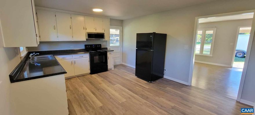 Newly renovated 3 bedroom, 2 bath townhome in Charlottesville. Fresh gray paint, luxury vinyl plank flooring, dishwasher, washer/dryer, carport, covered front patio, nice grassy side yard. Conveniently located near 5th Street Station and Interstate 64. Rent is $1,795 per month plus $200 utility fee for water/sewer, electric, trash, and lawn care. $45 application fee (credit 650+, income 3x monthly rent, rental history background check).