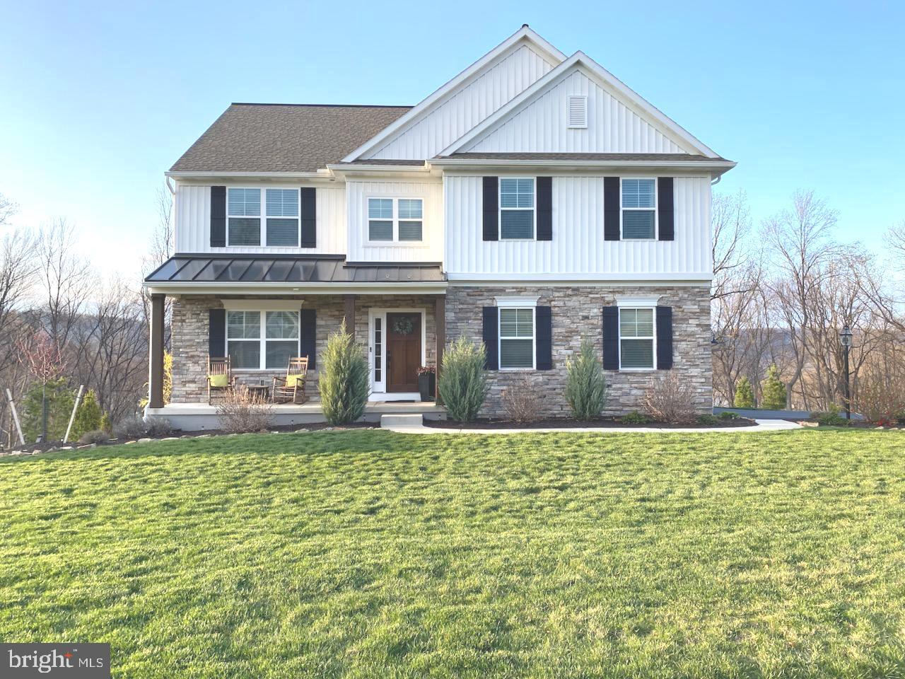 Welcome to beautiful Rockville Estates, where this impeccably maintained home is in model-home condition. Featuring engineered hardwood flooring throughout the main level, the open and inviting floor plan is perfect for modern living. The stunning kitchen boasts sleek finishes, a quartz island, a farmhouse sink, tall cabinets, and a large walk-in pantry. Adjacent to the kitchen is a lovely windowed breakfast area with a vaulted ceiling, a formal dining room, and an open, sunlit family room—ideal for entertaining. The main level also includes a private office and a convenient mudroom. Upstairs, the primary suite serves as a luxurious retreat with his and her walk-in closets, a double vanity sink, and a spacious walk-in shower. Three additional generously sized bedrooms offer built-in features and walk-in closets. A laundry room on the upper level adds ease and functionality. Take notice of the many upgrades including built-in shelving and transom-style windows. The walk-out basement remains unfinished, offering endless potential! You don't want to miss this opportunity - make your appointment today!