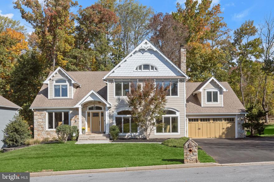 Welcome to this exquisite home in the Velvet Hills South neighborhood, offering three finished levels with four bedrooms and three-and-a-half bathrooms. Set on a 0.32-acre lot backing to trees, this home is tucked away on a quiet cul-de-sac. Step inside the foyer to discover rich cherry hardwood floors and ornate trim molding that add warmth and sophistication throughout the home. The front living room boasts a coffered ceiling, built-ins and a wood-burning fireplace, while the dining room provides an elegant setting for entertaining guests. Prepare your favorite meals in the gourmet kitchen equipped with granite countertops, a tile backsplash, 42-inch cabinets, an island, a pantry and a breakfast nook for casual meals. The impressive sunroom addition on the rear of the home has a soaring cathedral ceiling with skylights and access outside to the deck. Relax in the family room with a cozy gas fireplace with a stone surround. Just beyond, the office is a flexible space ideal for working or studying in private, with a two-story cathedral ceiling and more skylights. This room could also serve as a bedroom on the main level, with a closet and stairs up to a versatile loft. Finishing the main level is a half bathroom and a laundry room with access to the two-car garage. Upstairs, the primary bedroom suite also features a cathedral ceiling, along with a large walk-in closet. The renovated en-suite bathroom is adorned with marble tile, a walk-in shower with dual showerheads, a dual sink vanity, and a separate water closet with a soaking tub. Down the hall are the second bedroom and a hall bathroom, while the third and fourth bedrooms share a connecting bathroom. A balcony on the upper level overlooks the scenic backyard, perfect for a morning coffee or evening cocktail. Downstairs, the finished lower level expands the living space with a spacious recreation room, along with a utility room that provides storage space. Enjoy spending time outside in the fenced backyard with a large deck. Additional highlights include dual-zoned HVAC systems and mini-split systems in both the office and sunroom.