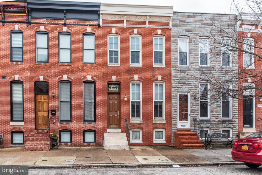 Beautiful home near the water in Canton! This home has it all! Home features beautiful pine floors, stained glass transom over front door, crown moldings, separate dining area, chef's kitchen complete with granite counter tops and stainless steel appliances, large bathrooms, and so much more! Once car parking pad at the rear of home and rooftop deck with gorgeous city views! Unfinished basement with additional storage space. Just a few steps from the Canton Square, what a great location!